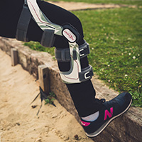 person with orthothic bracing fitted to their leg